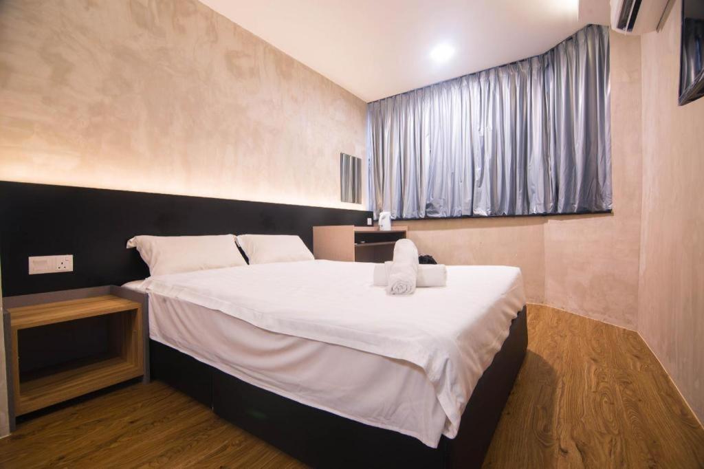 Monaco Boutique Hotel Sadong Jaya Kota Kinabalu Eksteriør bilde