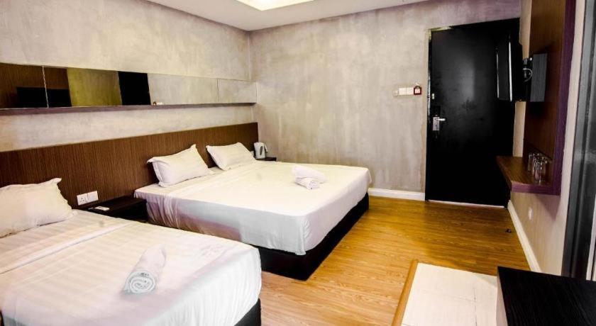 Monaco Boutique Hotel Sadong Jaya Kota Kinabalu Eksteriør bilde